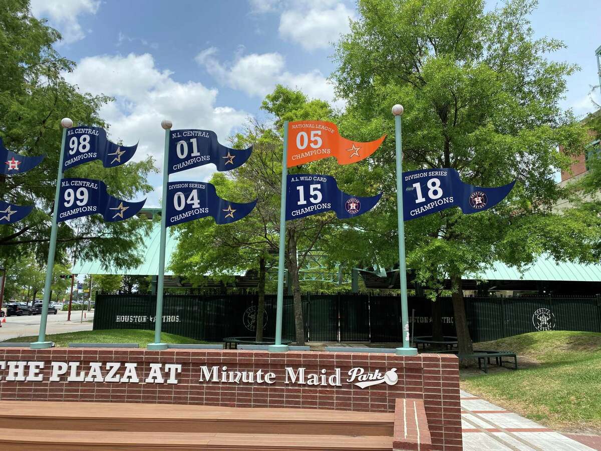 The Houston Astros' 2017 World Series championship banner is missing from the plaza outside Minute Maid Park on Monday, June 6, 2022.