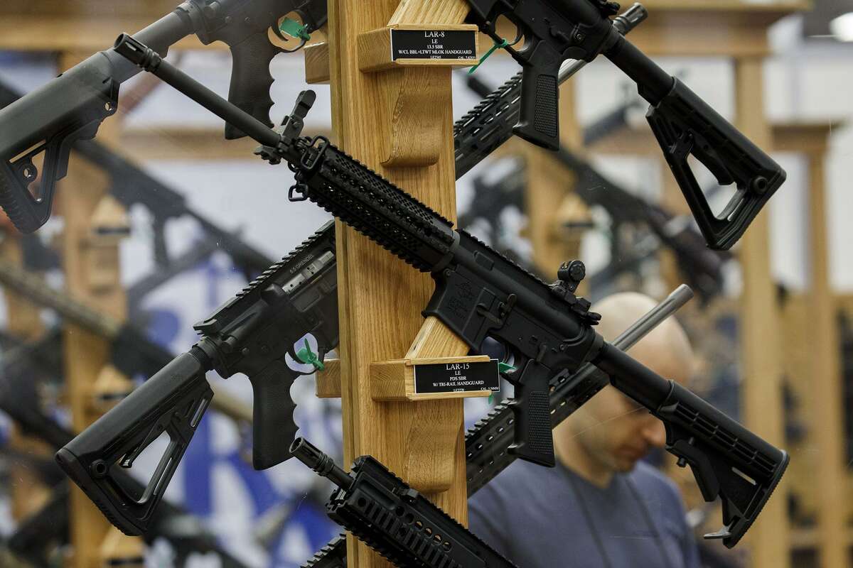 AR-15 style rifles from Rock River Arms are displayed during the National Rifle Association (NRA) annual meeting on Sunday, May 6, 2018, in Dallas, Texas.