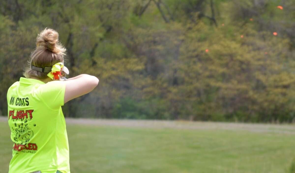 Madelyn Coats shoots at clay targets in competition for the South County Vipers earlier this season.