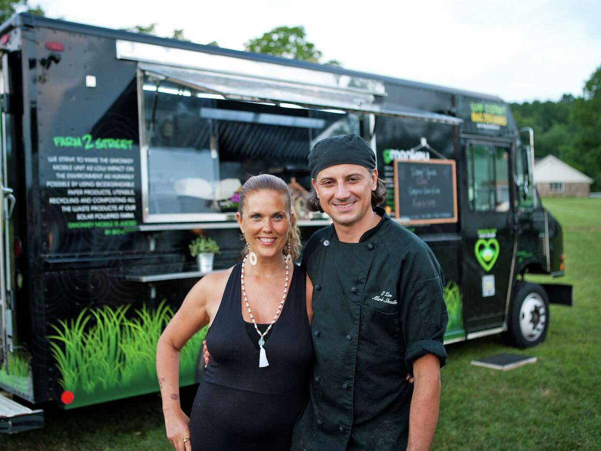 G Zen owners Chef Mark Shadle and Chef Ami Beach Shadle, in front of their food truck, which will be offering vegan delicacies at the Imagine New Age Free Festival in Branford on Sunday, June 12.