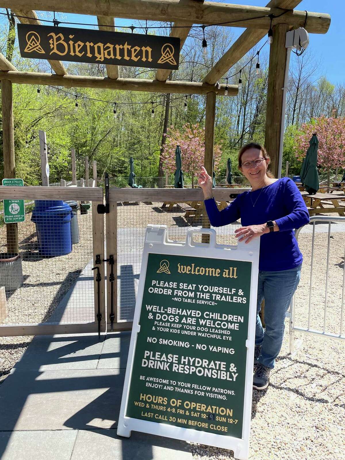 Theresa Servas, member of the Friends of Weir Farm Board of Directors, at the Nod Hill Biergarten which will play host to the release of a new limited-time beer collaboration with the brewery.