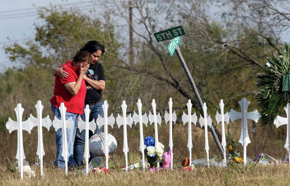 Lupita Alcoces, 48, right, hugs her mother, Maria Durand, 78, at a memorial for the First Baptist Church shooting victims in Sutherland Springs, Texas, Tuesday, Nov. 7, 2017. On Sunday, Devin Patrick Kelley, 26, walked in on worshippers and killed 26 women, men and children, injuring dozens in the shooting. Durand was a bible study teacher aide at the church and knew several of the victims.