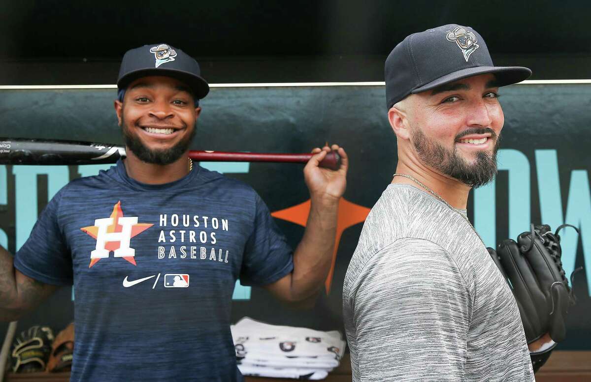 Former University of Houston baseball players Corey Julks, left, and Nick Hernandez, now playing for the Sugar Land Space Cowboys, strike a pose at Constellation Field on June 1, 2022.