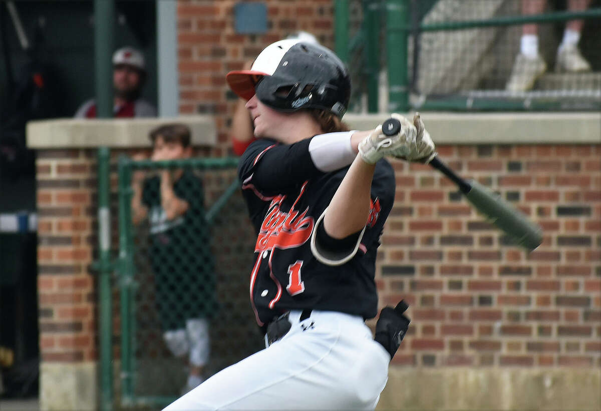 Edwardsville's Cole Funkhouser hits the game-winning single up the middle in the seventh against Plainfield North on Monday in the Class 4A Illinois Wesleyan Super-Sectional at Jack Horenberger in Bloomington.