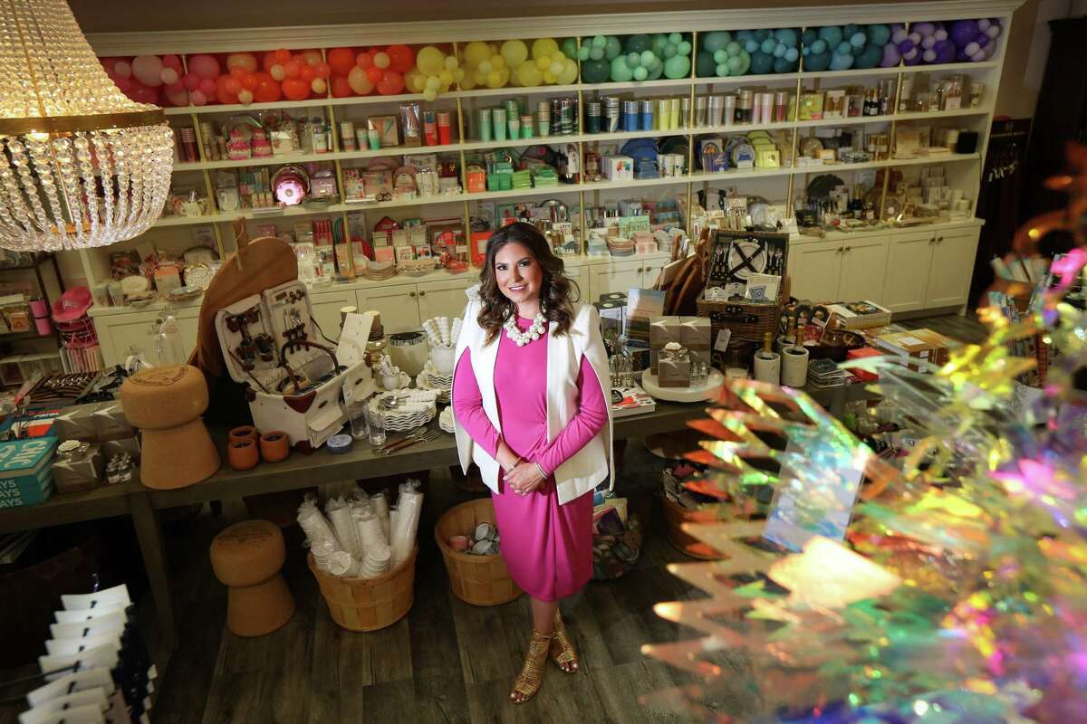 Meagan Morris, founder of Sip Sip Hooray, poses for a portrait Tuesday, May 31, 2022, at her shop in Tomball.