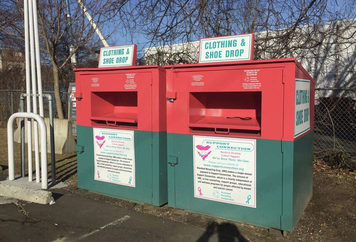 These donation bins in Stamford, owned by Standard Recycling Corporation, are among numerous ones located throughout the state. Trumbull is starting a program where instead of taking their clothes for recycling, residents can schedule a pick up of these items.