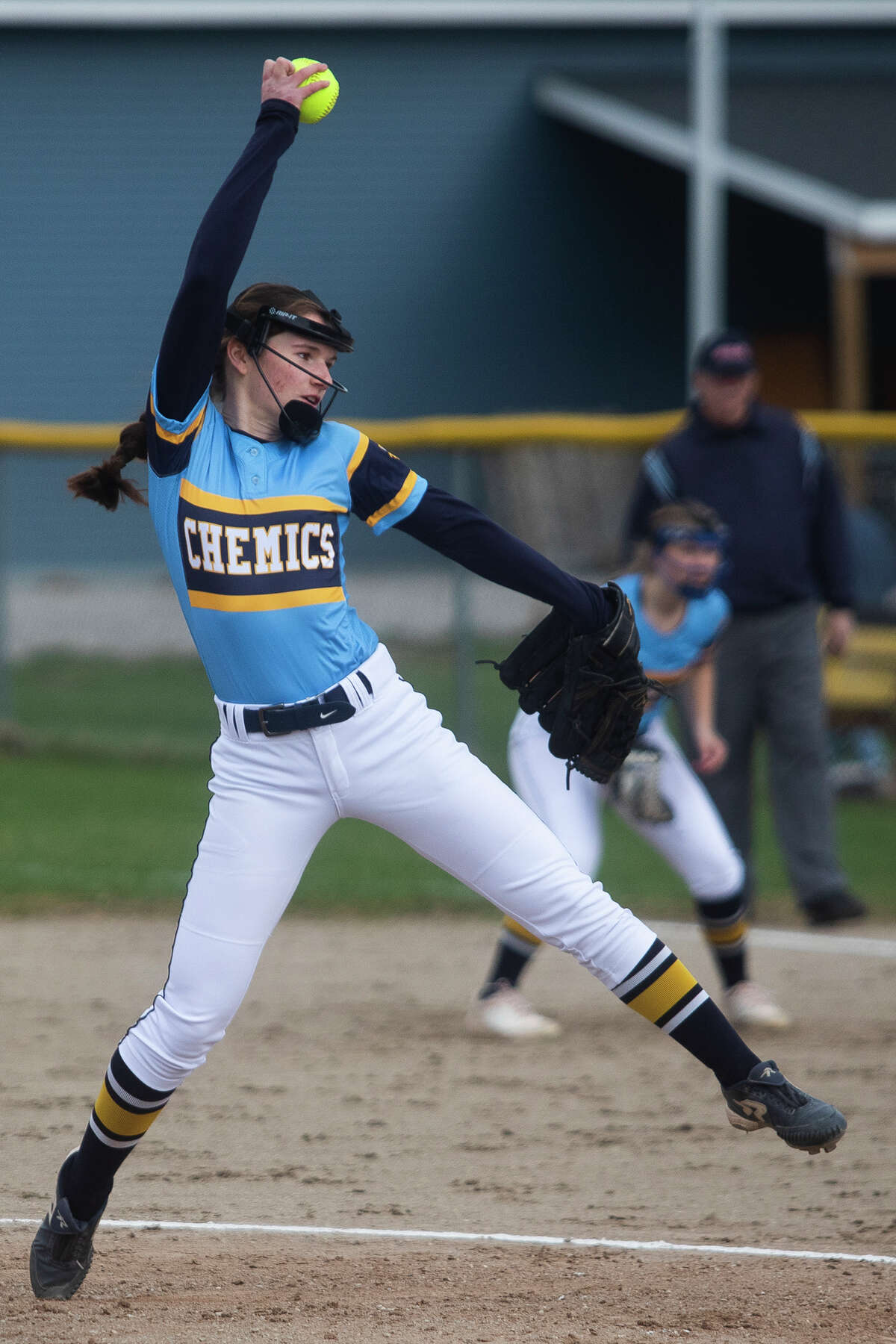 Midland High's Rachel Mecca delivers a pitch during an April 25, 2022 game against Grand Blanc.