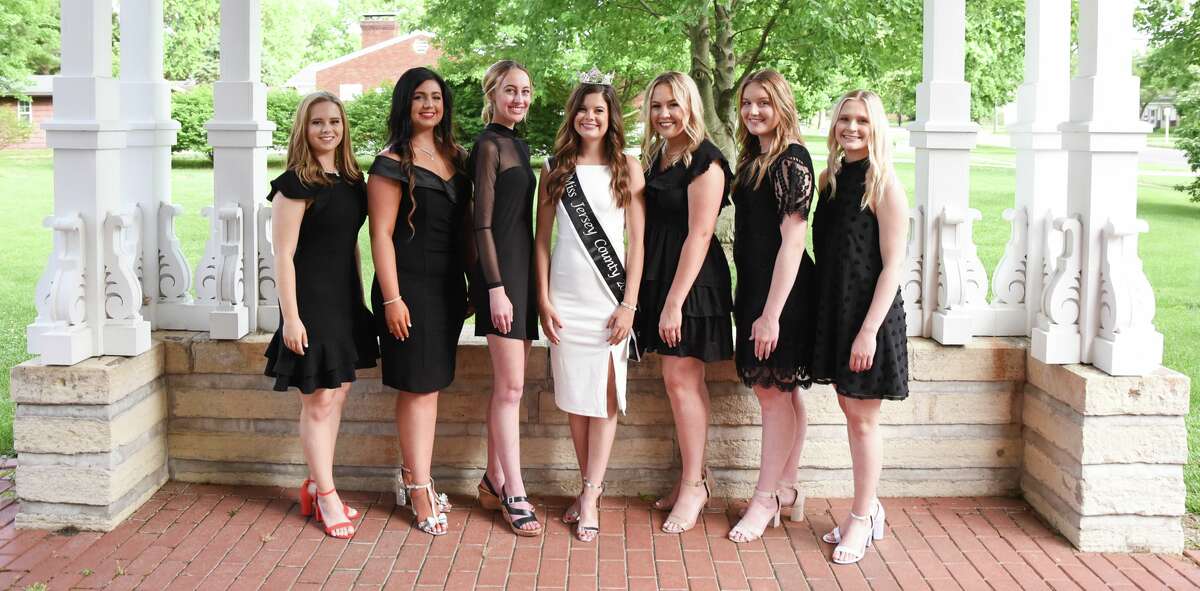 Miss Jersey County Aubrey McCormick, center, is joined by the contestants in the 2022 Jersey County Queen Pageant: from left, Emma Hahn, Kailey Smith, Tabitha McGuire, Matilynn Thornsbury, Allie Hunn and Sammie Malley.