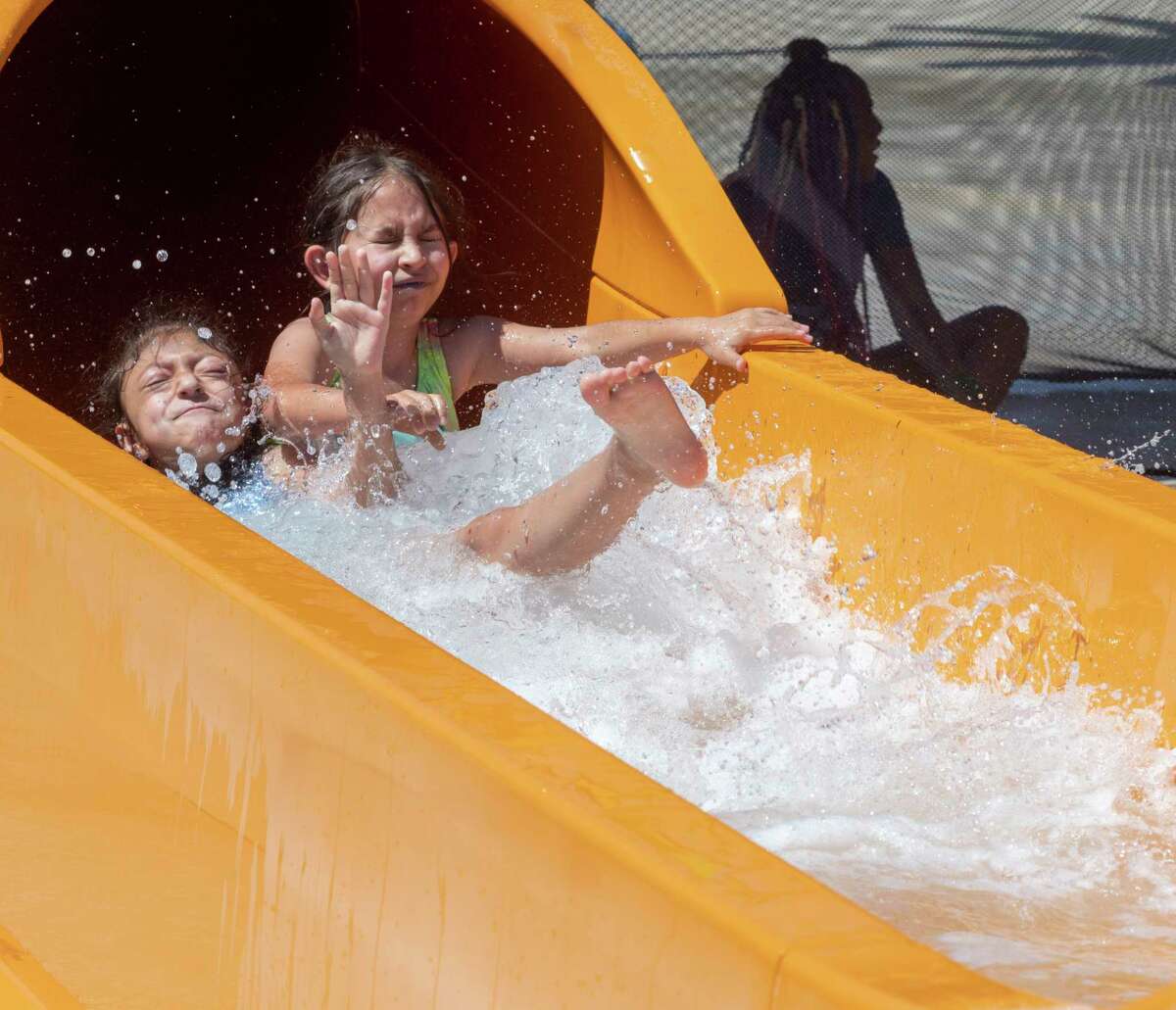 Midlanders try to beat the heat 06/07/2022 at the splash pad at Dennis The Menace Park. Temperatures soared into the 100's. Tim Fischer/Reporter-Telegram