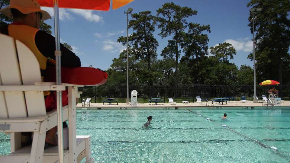 Lifeguards watch over swimmers at the Mason Park swim pool on Tuesday, June 7, 2022 in Houston.