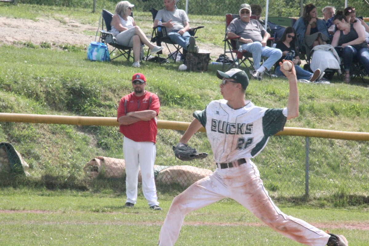 Jordan Nelson delivers a pitch for Pine River during the district tournament game.