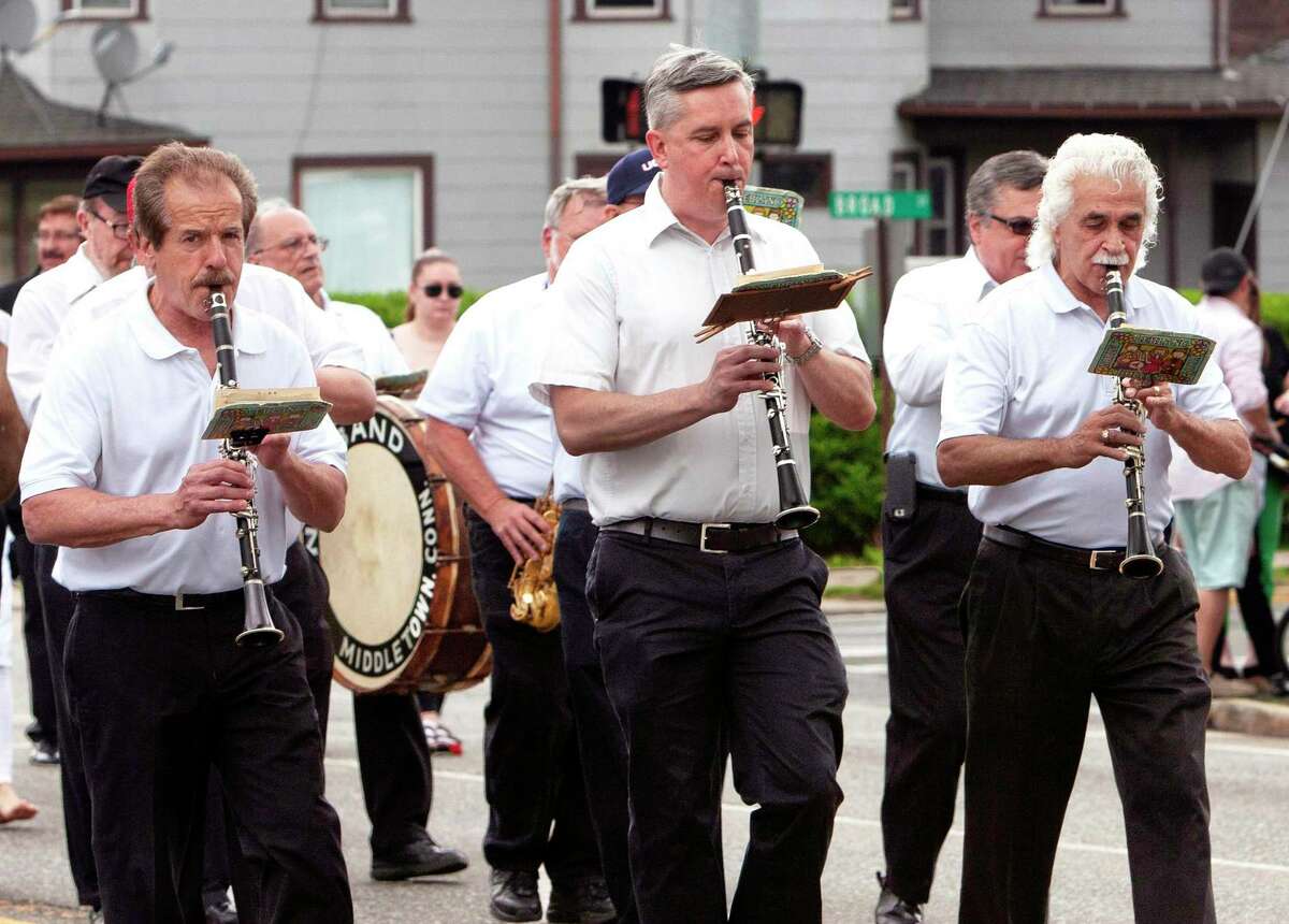 The Sam Vinci Band marches and plays the St. Sebastian Church Feast song “#7” in the “I Nuri” processional during the parade May 15. At right is Sam Vinci.