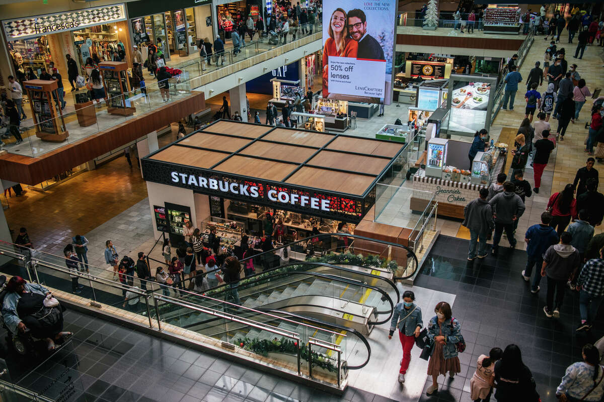People shop in The Galleria mall during Black Friday on November 26, 2021 in Houston, Texas.