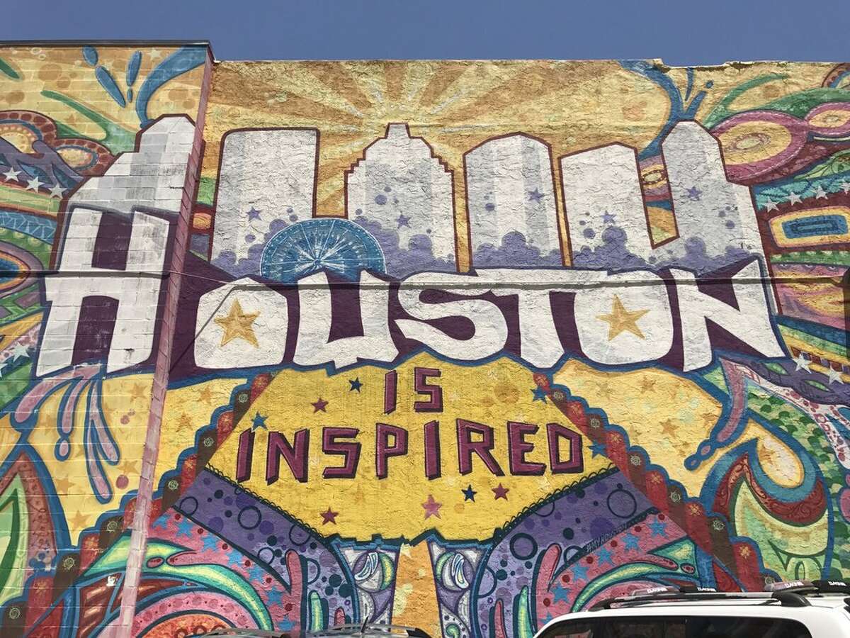 The "Houston is Inspired" mural seen in downtown Houston on Travis & Preston Streets.