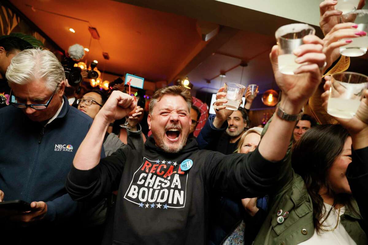 Mark Dietrich celebrates the incoming results of Prop. H at an election night party at Del Mar on Tuesday, June 7, 2022, in San Francisco, Calif. The event was supporting the recall of District Attorney Chesa Boudin through Prop. H.