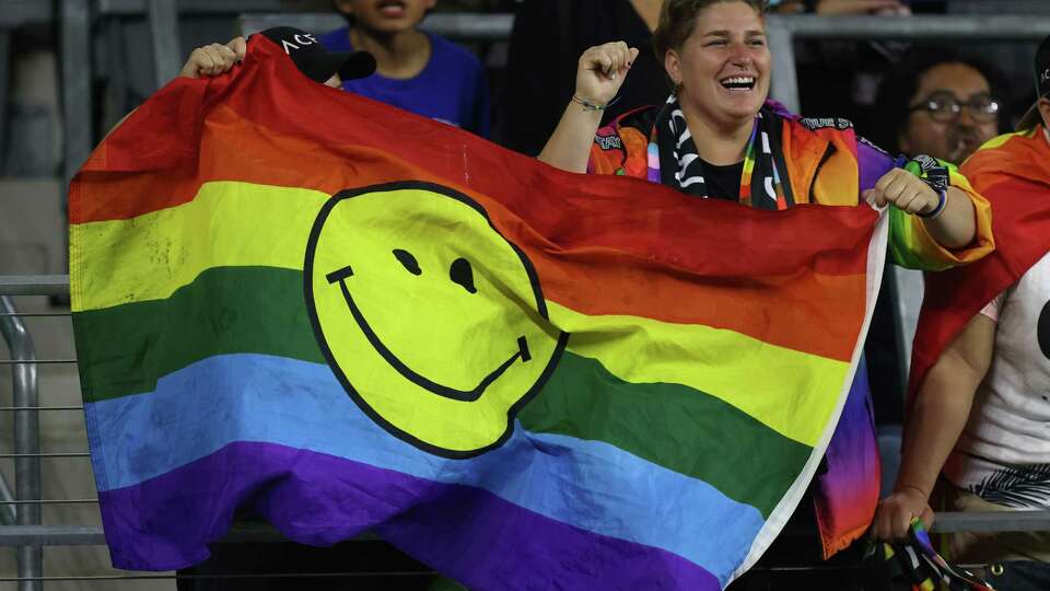 LOS ANGELES, CALIFORNIA - JUNE 07: Fans cheer during the Pride Night game between Angel City FC and the Houston Dash at Banc of California Stadium on June 07, 2022 in Los Angeles, California.