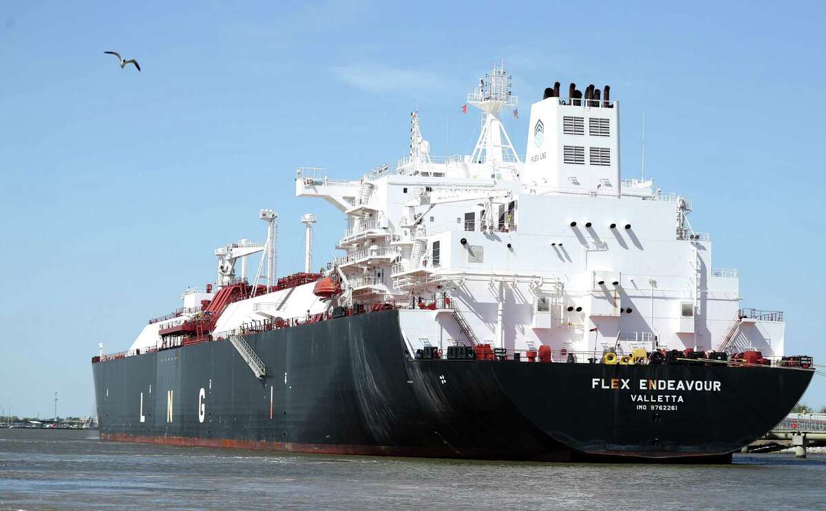 A LNG tanker is docked to be loaded up with LNG at Cheniere’s Sabine Pass LNG Terminal.