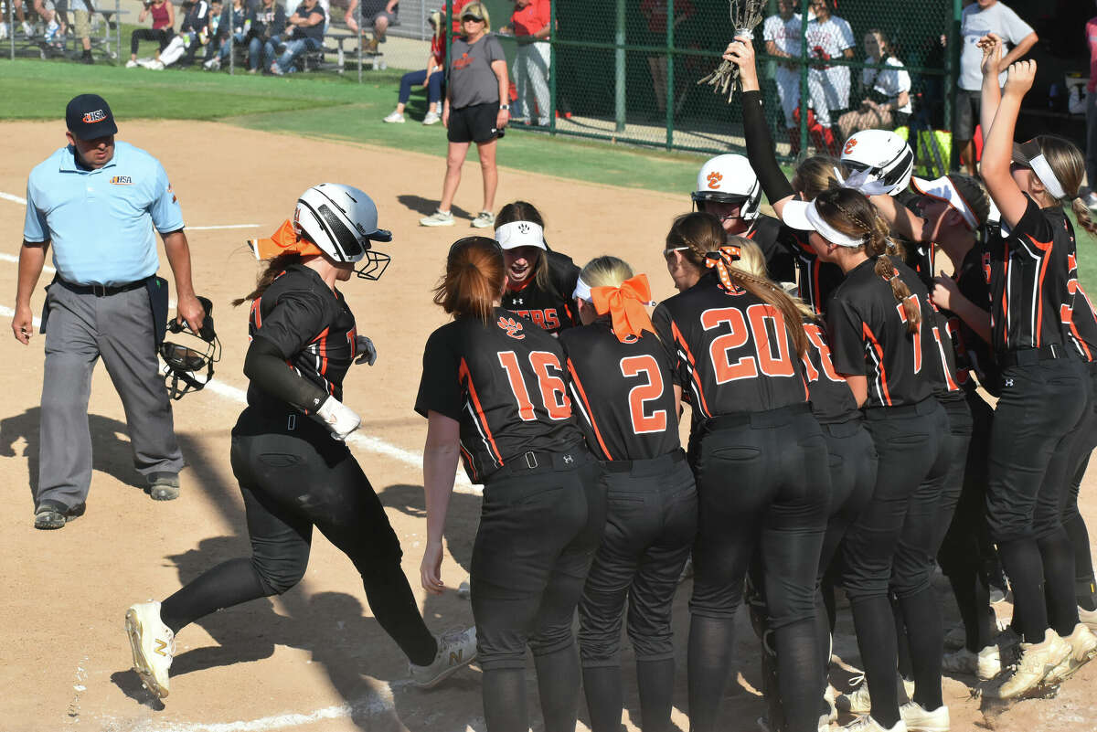 Edwardsville's Lexie Griffin celebrates her home run during the Class 4A Illinois Wesleyan Super-Sectional at Inspiration Field on Tuesday in Bloomington.