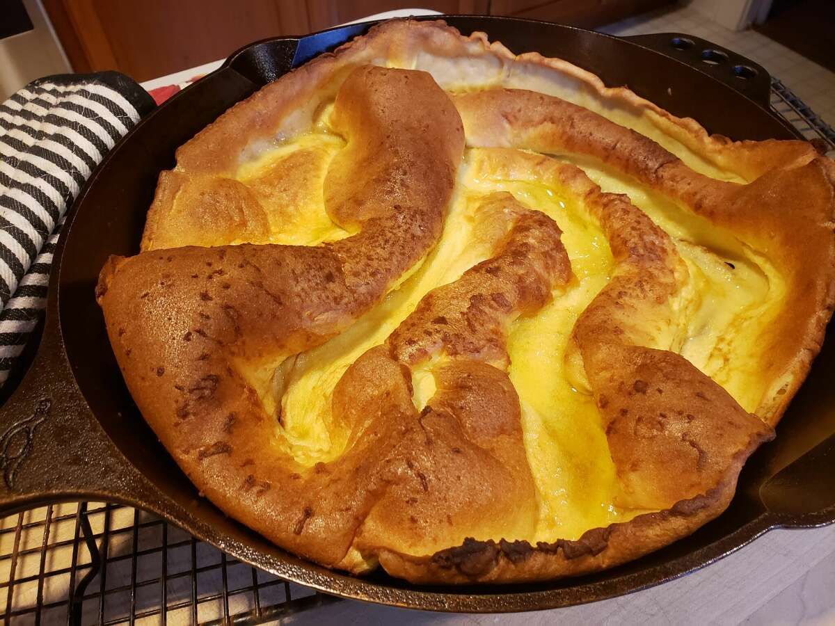 Somewhere between a crêpe, a popover and a pancake, the oven-baked Dutch baby turns golden brown as it balloons in the oven.