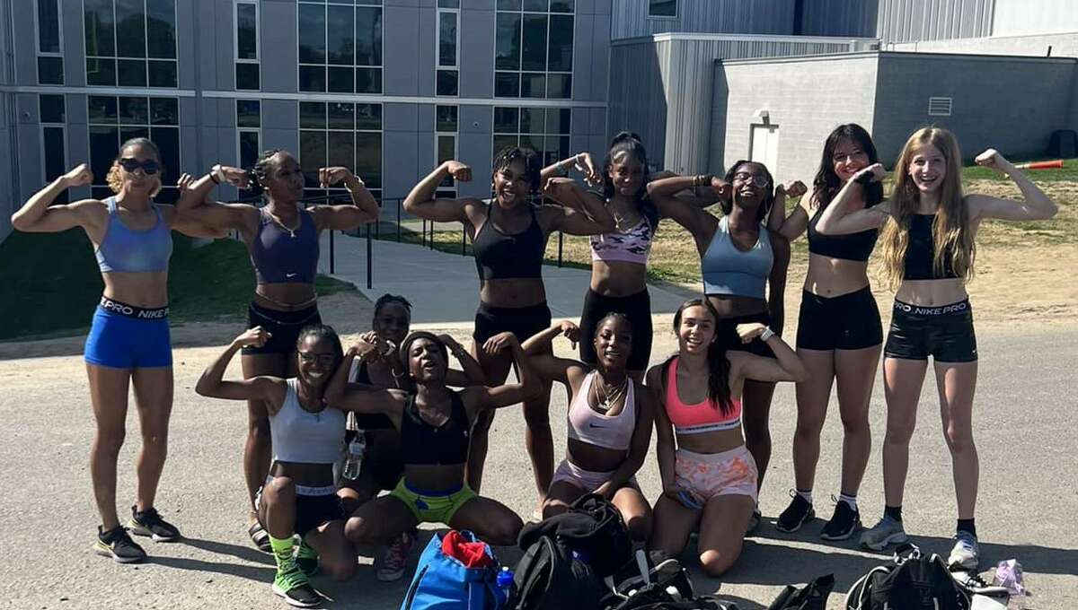 Members of the Albany High School track team wearing their sports bras.