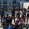 Members of the Albany High School track team wearing their supposedly controversial sports bras.