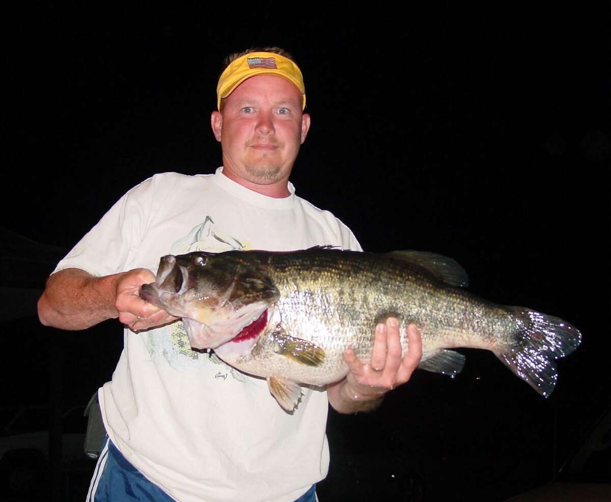 Back in 2004 Toby McDonald caught this 13.20 pound Lunker bass while fishing for catfish at night on Lake Conroe.