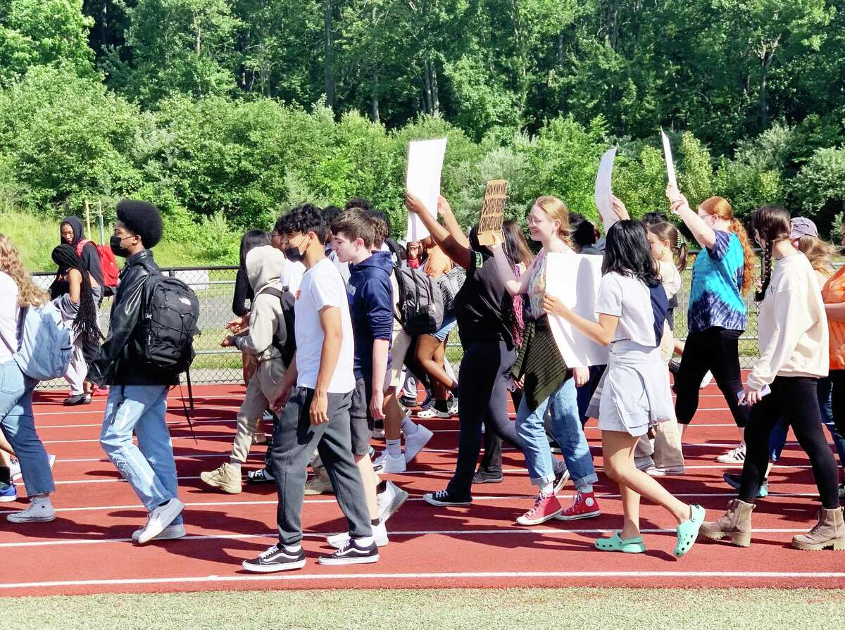 Local high school students and members of the Student Education and Activism Middletown group conducted a walkout Tuesday morning to advocate for tighter gun legislation.