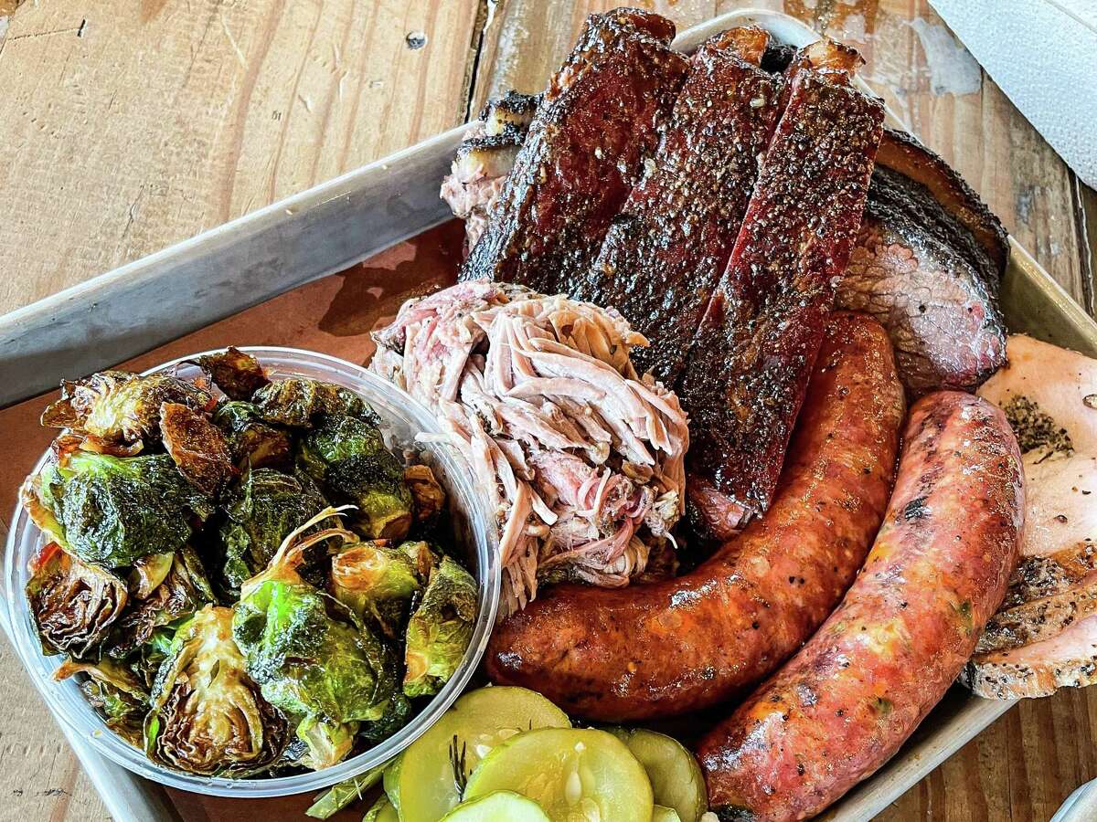 Pulled pork, ribs, sausage, brisket, turkey and brussels sprouts at Truth BBQ.