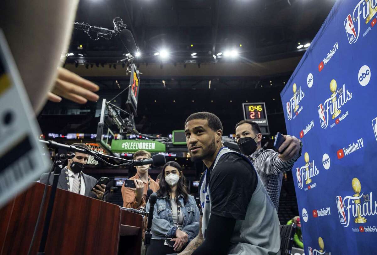 Gary Payton II (0) answers questions from the press during media availability as the Golden State Warriors practiced the day before playing the Boston Celtics in Game 3 of the NBA Finals at TD Garden in Boston, Mass., on Tuesday, June 7, 2022.