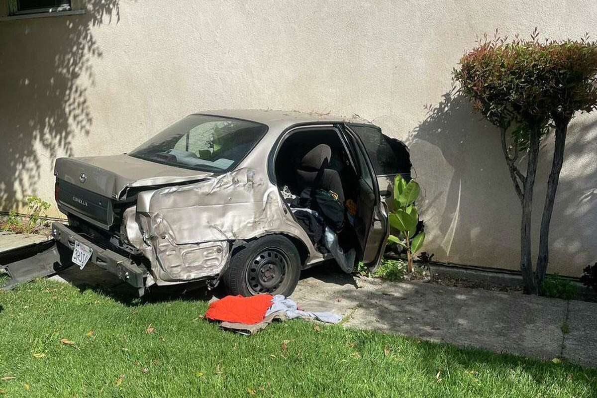 A driver crashed into the side of a home in Martinez on Wednesday morning and fled on foot — but left behind a gas leak that led to several road closures, authorities said.