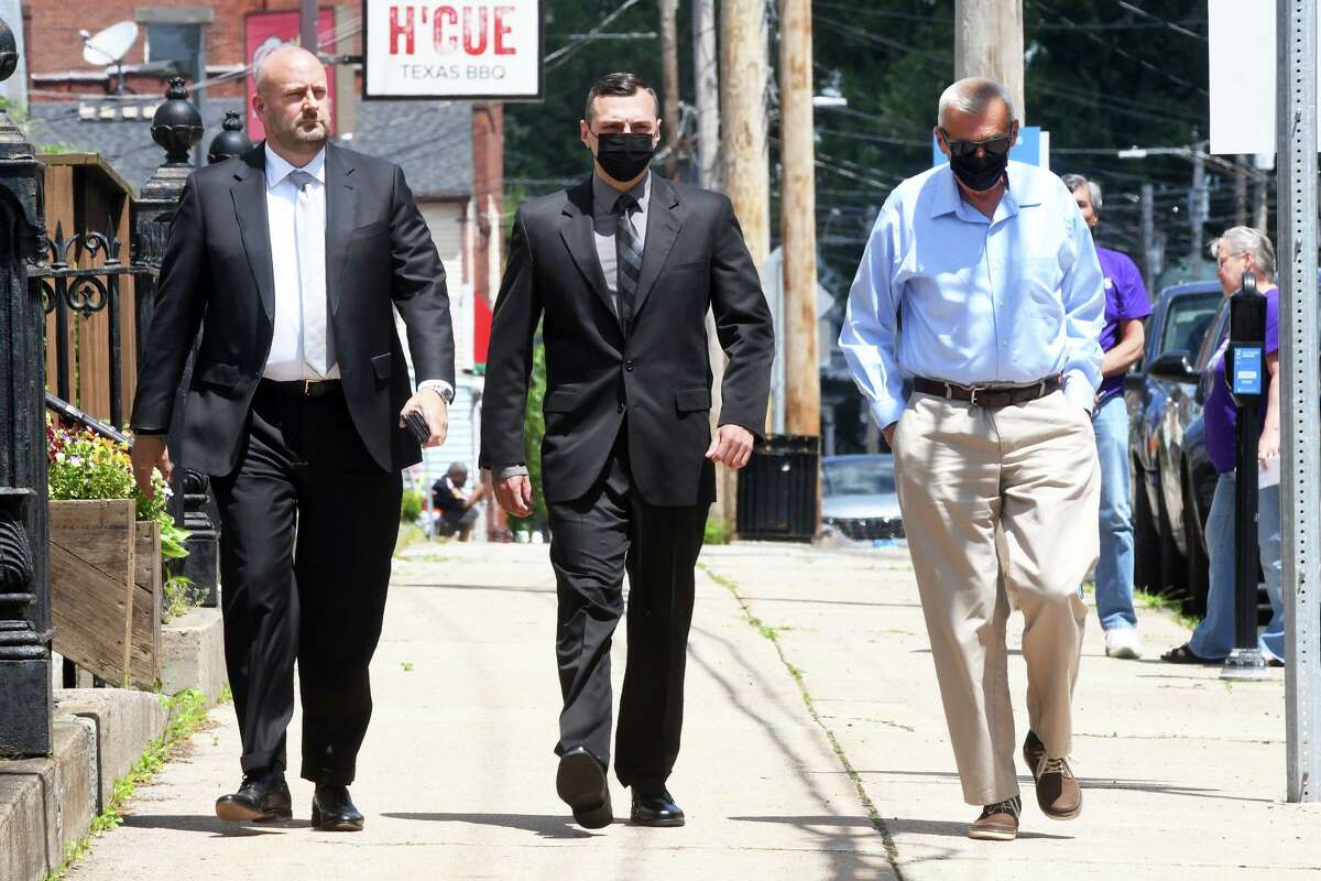 Trumbull Police Officer Matthew Perkowski arrives at Superior Court in Derby, Conn. June 8, 2022.