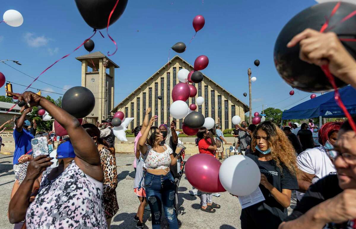 People release balloons Wednesday into the sky at Antioch Missionary Baptist Church in remembrance of the 19 children and two adults killed May 24 at Robb Elementary School in Uvalde by a man with an assault rifle.