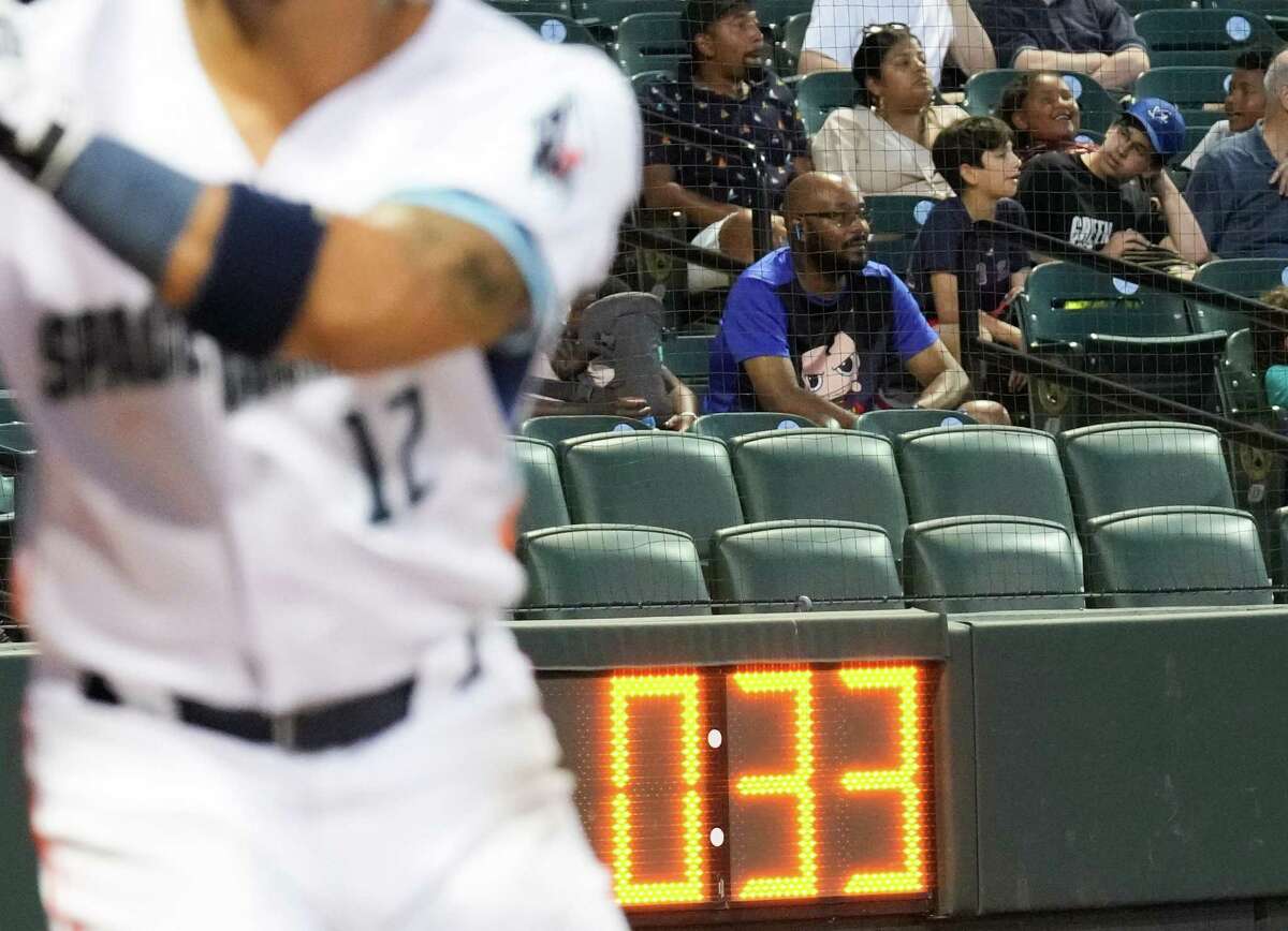 The pitch clock at Sugar Land’s Constellation Field lets an Albuquerque reliever know how much warm-up time he has left. Once the game resumes, he’ll have 14 seconds to throw a pitch, 19 if anyone is on base.