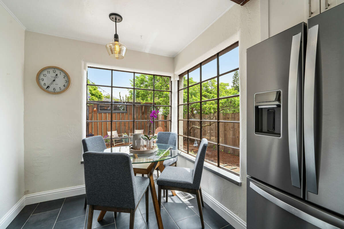 The breakfast nook looks out on the 3,605-square-foot landscaped and fenced lot. 