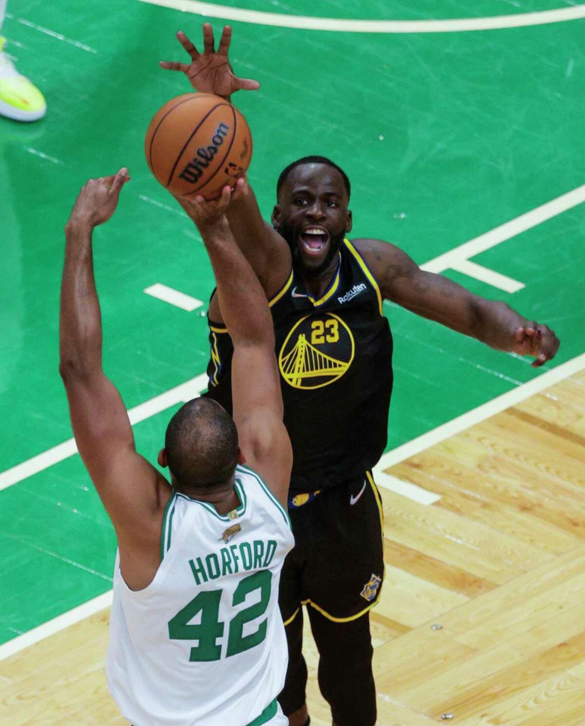 Golden State Warriors' Draymond Green, 23, defends against Boston Celtics' Al Horford, 42, during the second quarter of the NBA Finals at TD Garden in Boston, Mass., on Wednesday, June 8, 2022.