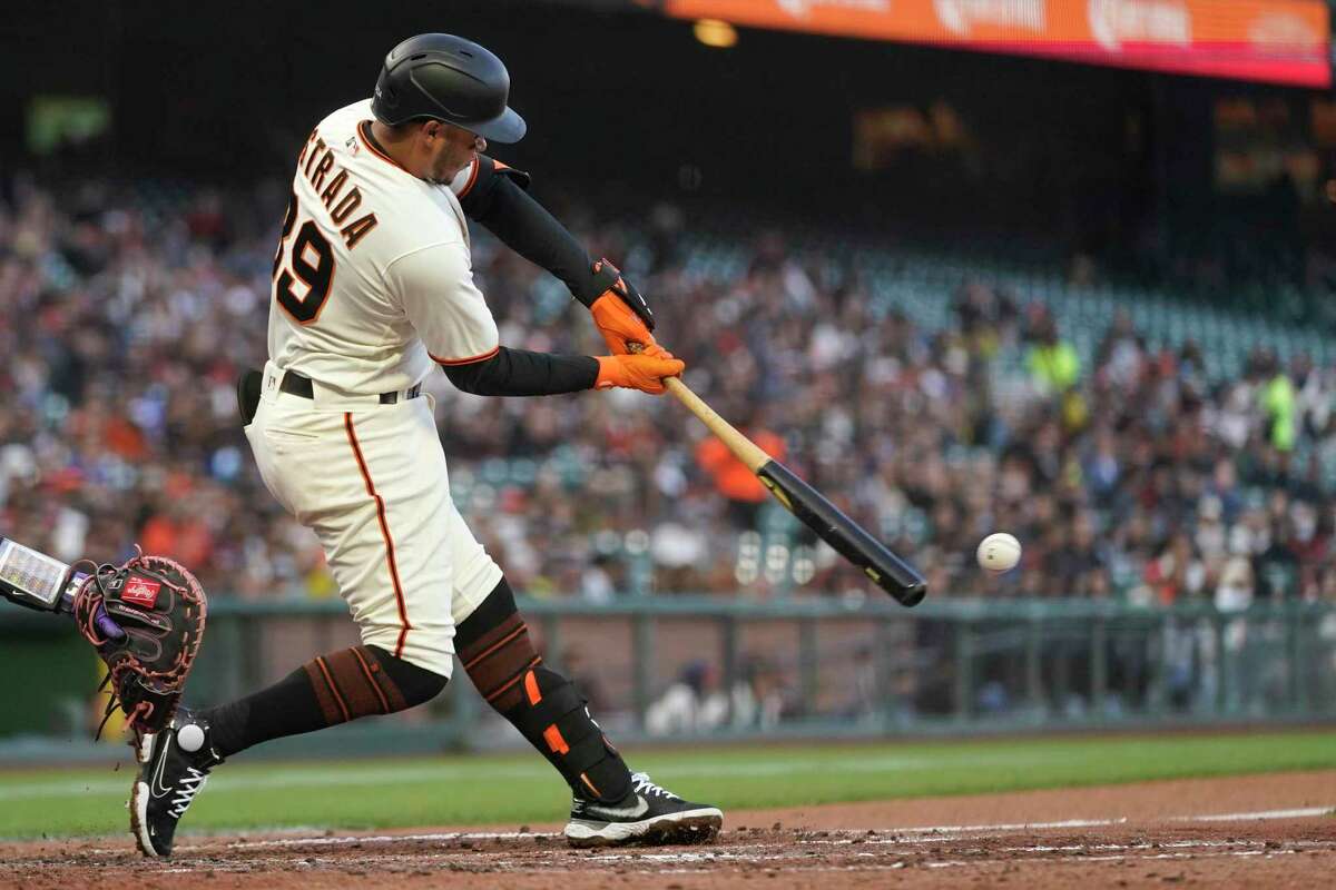 San Francisco Giants' Thairo Estrada hits an RBI single against the Colorado Rockies during the fourth inning of a baseball game in San Francisco, Wednesday, June 8, 2022. (AP Photo/Jeff Chiu)