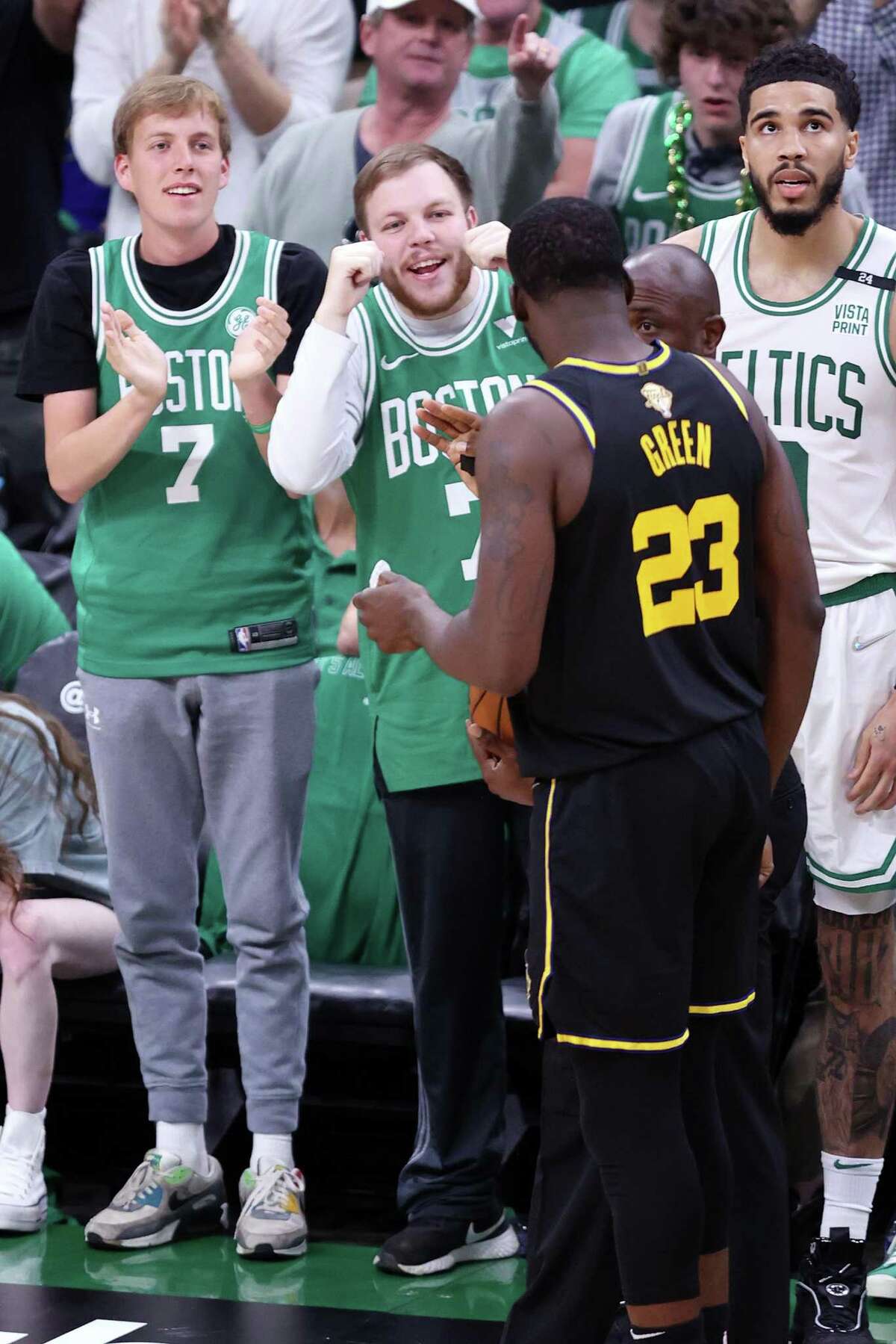 Boston Celtics’ fans tease Golden State Warriors’ Draymond Green after a 2nd quarter foul during Celtics’ 116-100 win during Game 3 of NBA Finals at TD Garden in Boston, Massachusetts, on Wednesday, June 8, 2022.