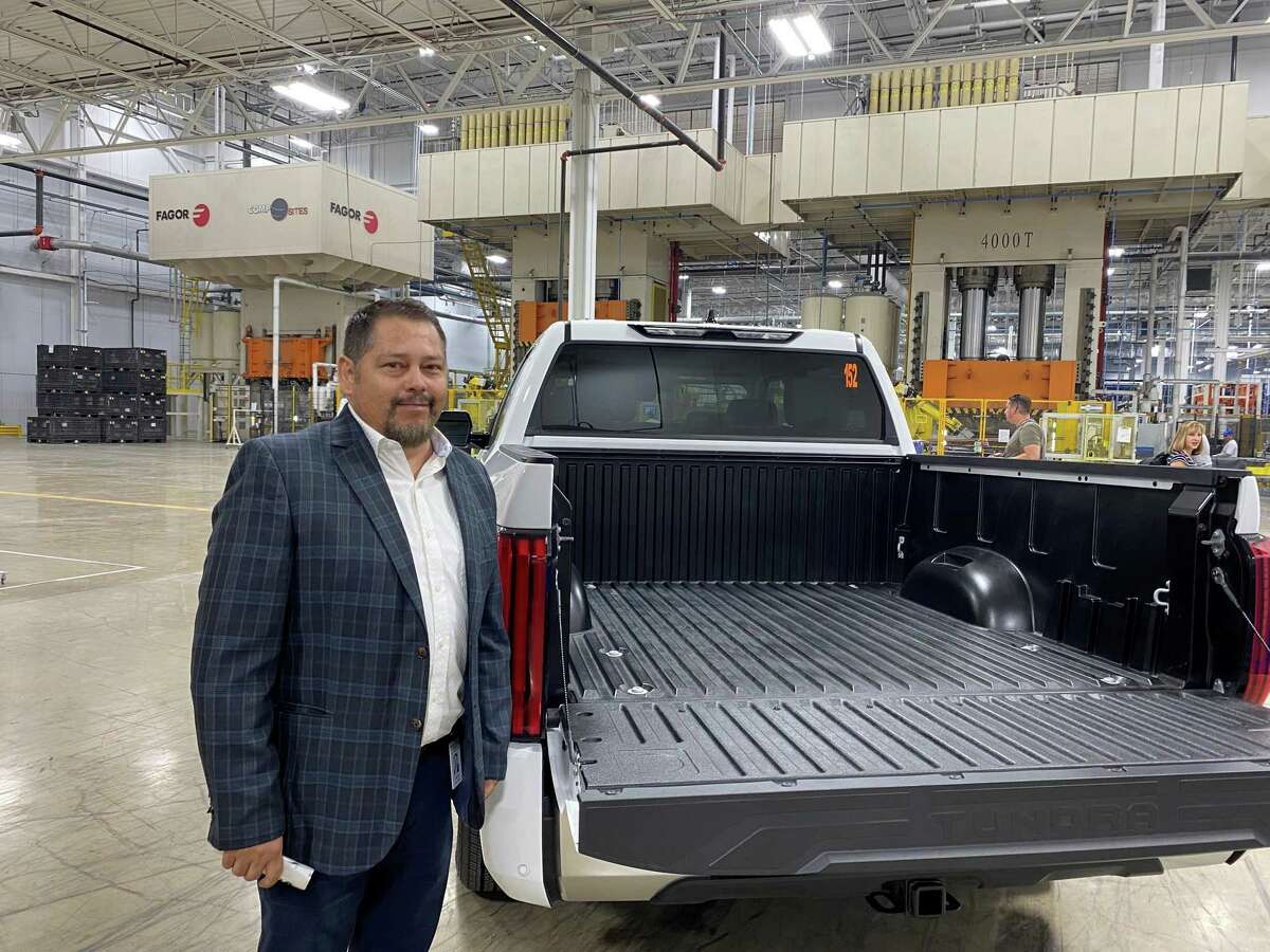 Bruno Santillan, manager of Teijin Automotive Technologies’ new manufacturing plant in Seguin, displays a truck bed produced at the facility.