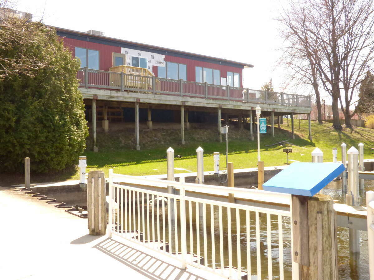 The sale of a city-owned dock area to restaurant-owner Ted Fricano has been temporarily suspended according to Manistee City Manager Bill Gambill. 