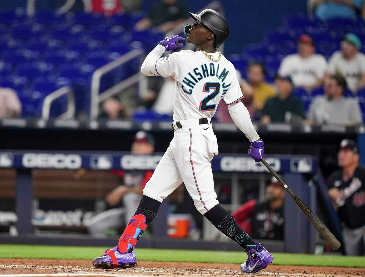 Marlins second baseman Jazz Chisholm tracks the flight of a grand slam against the Naitonals on Tuesday, part of his six-RBI night that also included a two-run homer.