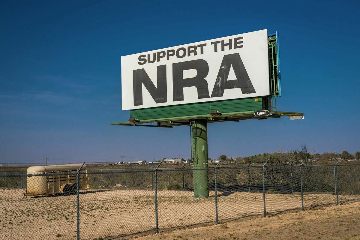 NRA, National Rifle Association, sign promotes membership of NRA, Texas. (Photo by: Visions of America/Joe Sohm/Universal Images Group via Getty Images)