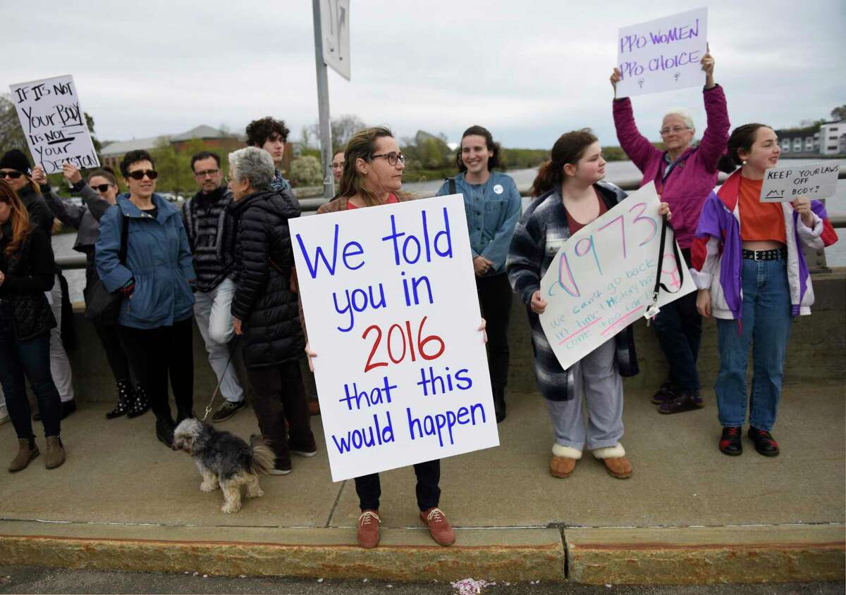 Abortion-rights advocates attend the rally at the Ruth Steinkraus Cohen Bridge in downtown Westport on Sunday, May 8.