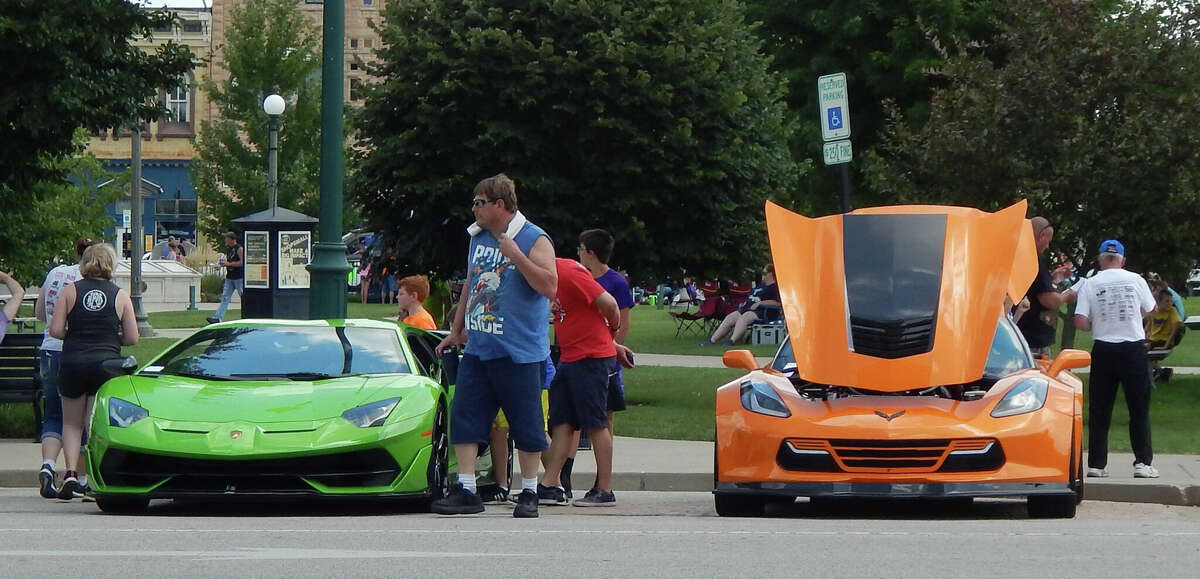 Visitors to the Morton Avenue Misfits' car show in August 2020 on the downtown Jacksonville square check out a Lamborghini.