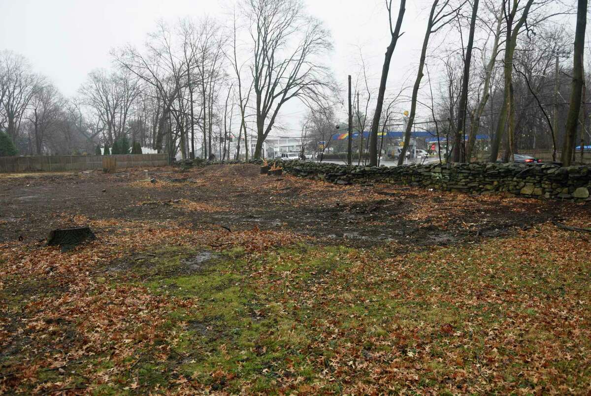 Trees were cut down on the site of a proposed apartment building on Brookridge Drive in Greenwich, Conn. Wednesday, Jan. 5, 2022.
