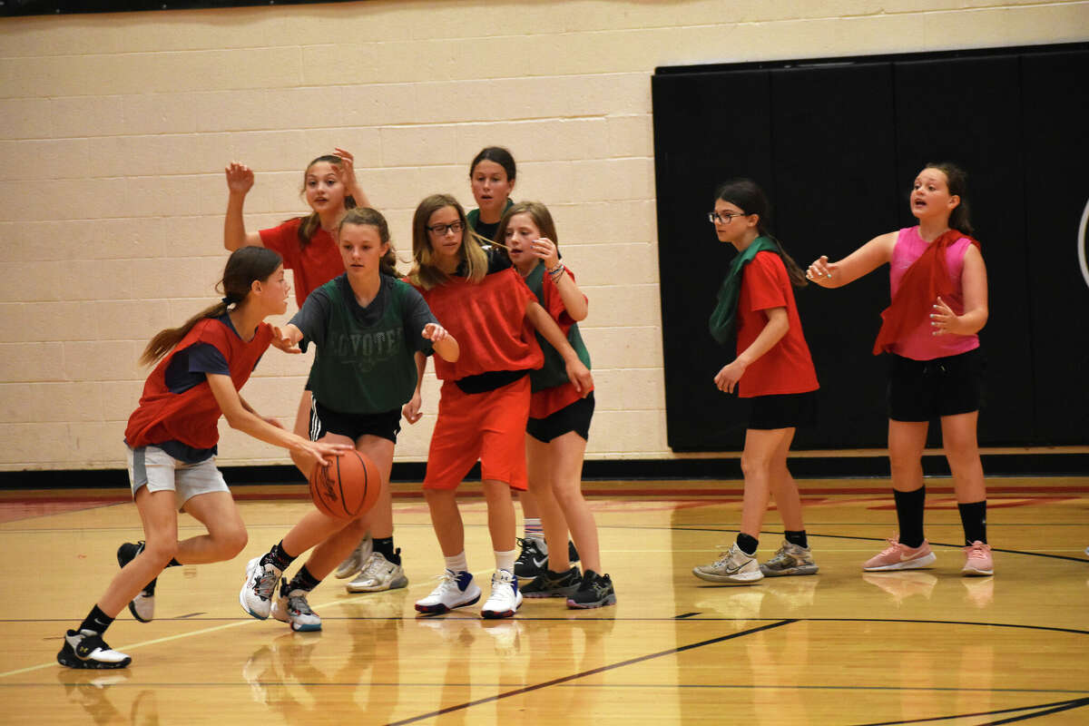 Over 130 students attended the three day camp from June 7-9. They would learn a multitude of basketball skills taught by both boys and girls coaches and players.