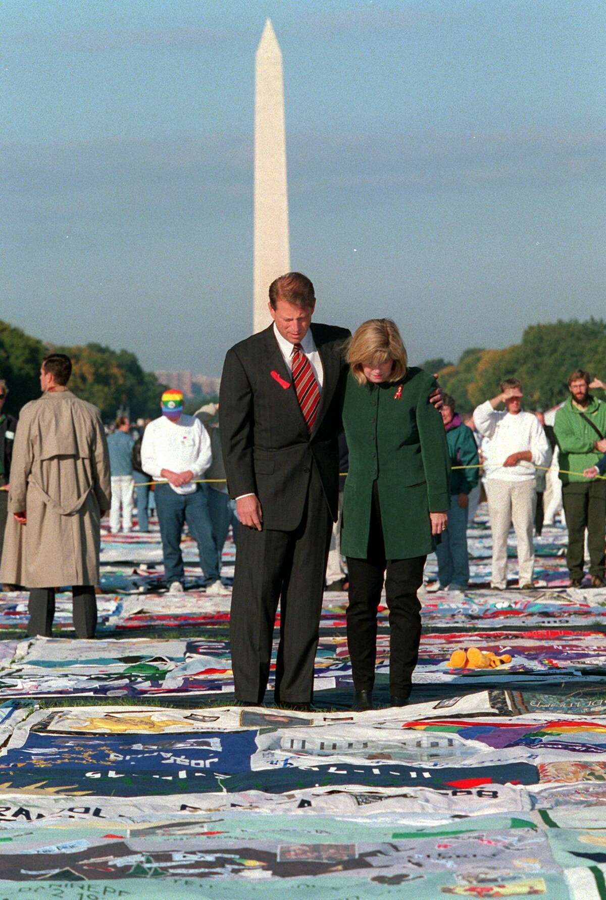 Vice President Al Gore and wife Tipper Gore view the AIDS Memorial Quilt on the Mall in Washington, DC in 1996.
