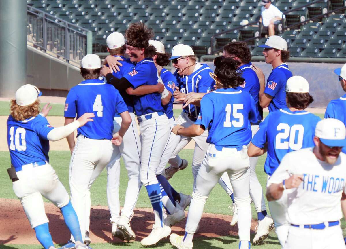 Friendswood players reacts after defeating Mansfield Legacy in the UIL baseball 5A semifinal on Thursday, Jun 9, 2022 at the Dell Diamond in Round Rock, TX.