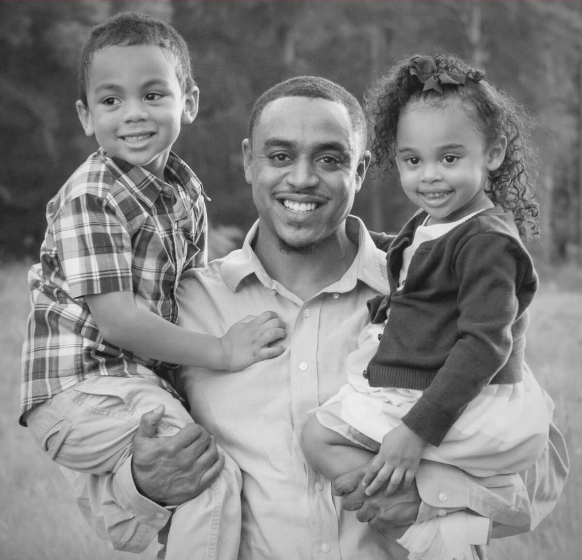 Tillman Givens III, a businessman and founder of Phenomenal Dads, with his son, Tillman IV, 6, and daughter, Aubrey, 4