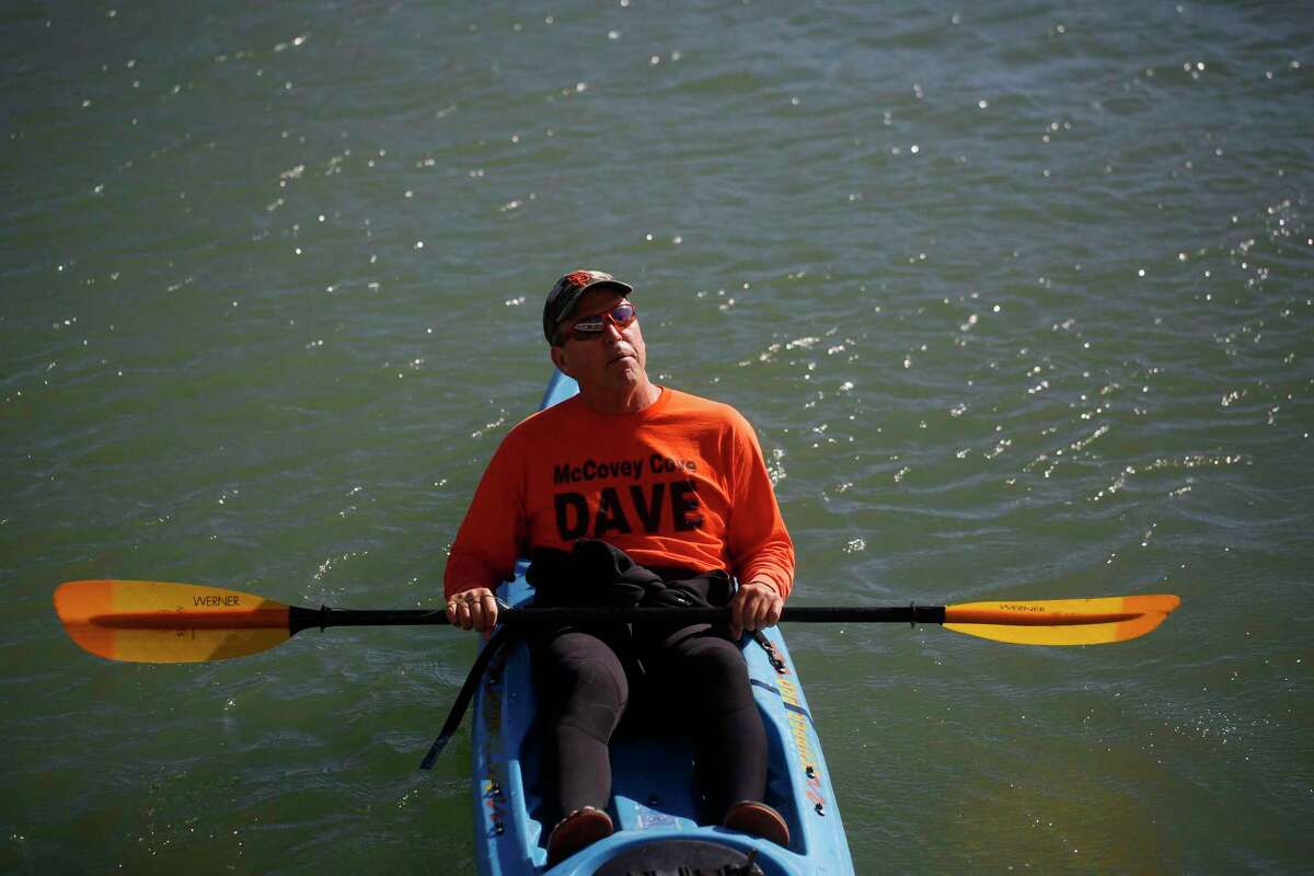 Giants fan Dave "McCovey Cove Dave" Edlund waits in his kayak before the start of game five of the World Series against the Kansas City Royals at then-AT&T Park on Sunday Oct. 26, 2014 in San Francisco.