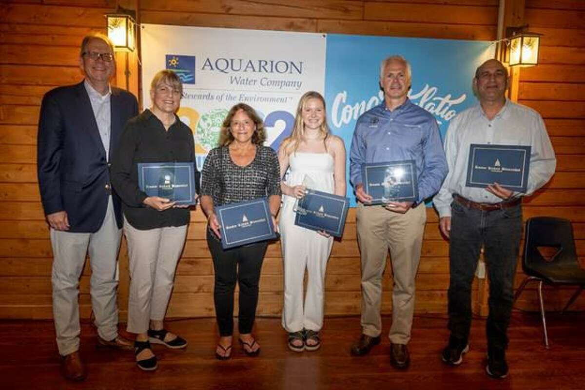 From left, Donald Morrissey, President - Aquarion Water Company; Mary Ellen Lemay, Chair of the Town of Trumbull Conservation Commission; Lynn Werner, Executive Director of the Housatonic Valley Association; Izzy Kaufman, New Canaan High School student; Peter Tibbetts, Manager of Scrap and Revert at Pratt & Whitney; and Robert Kaye, owner of Nod Hill Brewery.